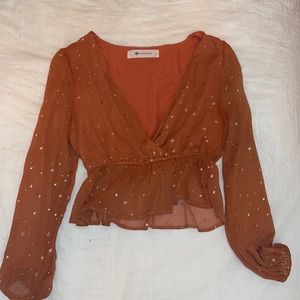 Impeccable Pig dark orange v neck long sleeve blouse with gold stars, size small